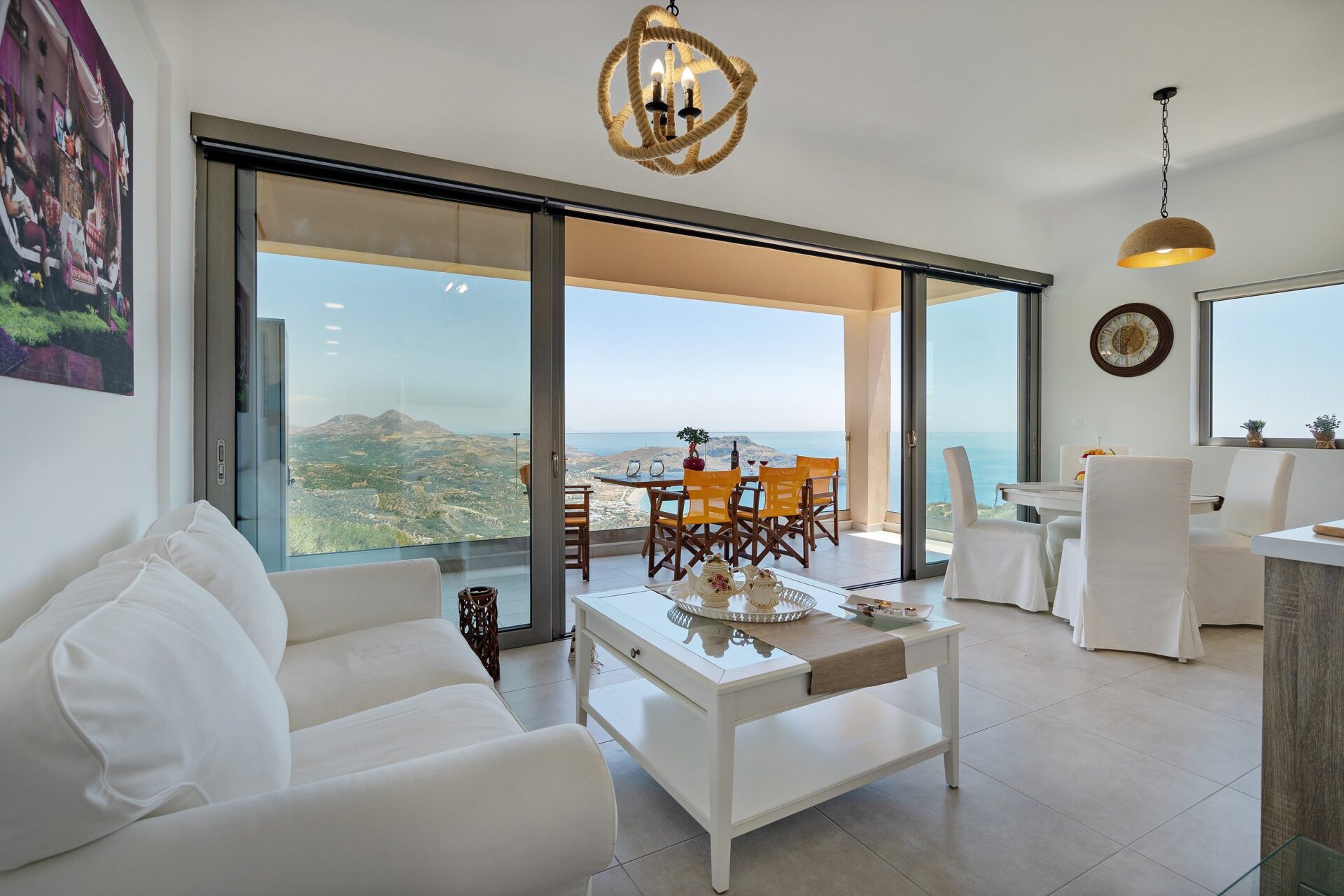 Light filled living space opening onto the sea view terrace